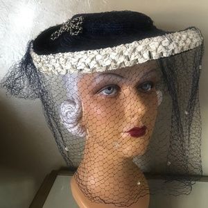 STRIKING 1940s' NAVY AND WHITE WIDE BRIM HAT WITH NAVY/WHITE DOTTED VEIL